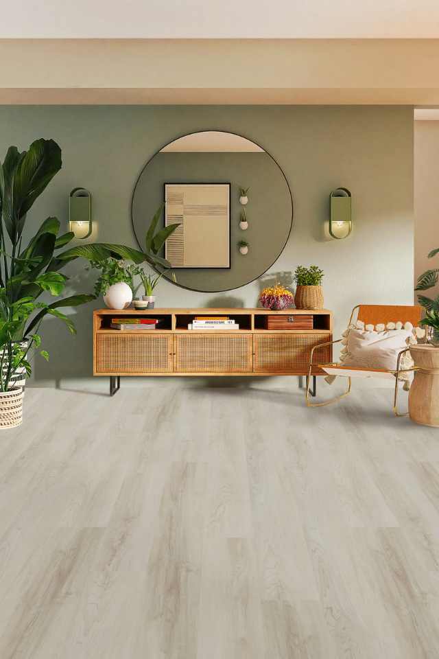 light gray luxury vinyl plank in mid century modern living room with rattan media console